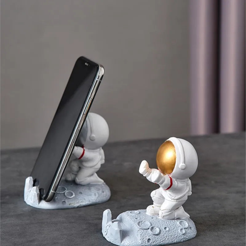 "Galactic Vibes: Nordic Style Astronaut Mobile Phone Stand – Unique Resin Desk Ornament and Fun Gift for Space Lovers!"