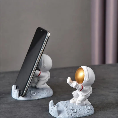 "Galactic Vibes: Nordic Style Astronaut Mobile Phone Stand – Unique Resin Desk Ornament and Fun Gift for Space Lovers!"